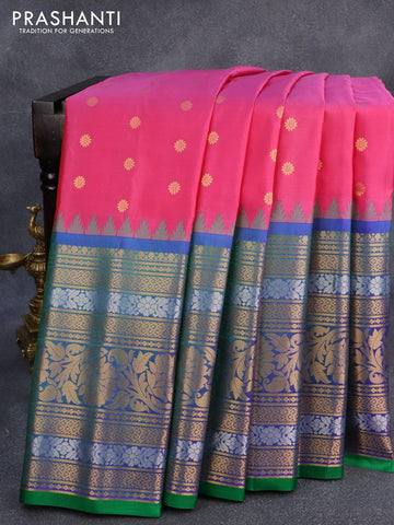 Pure gadwal silk saree pink and green with zari woven floral buttas and temple design long zari woven border