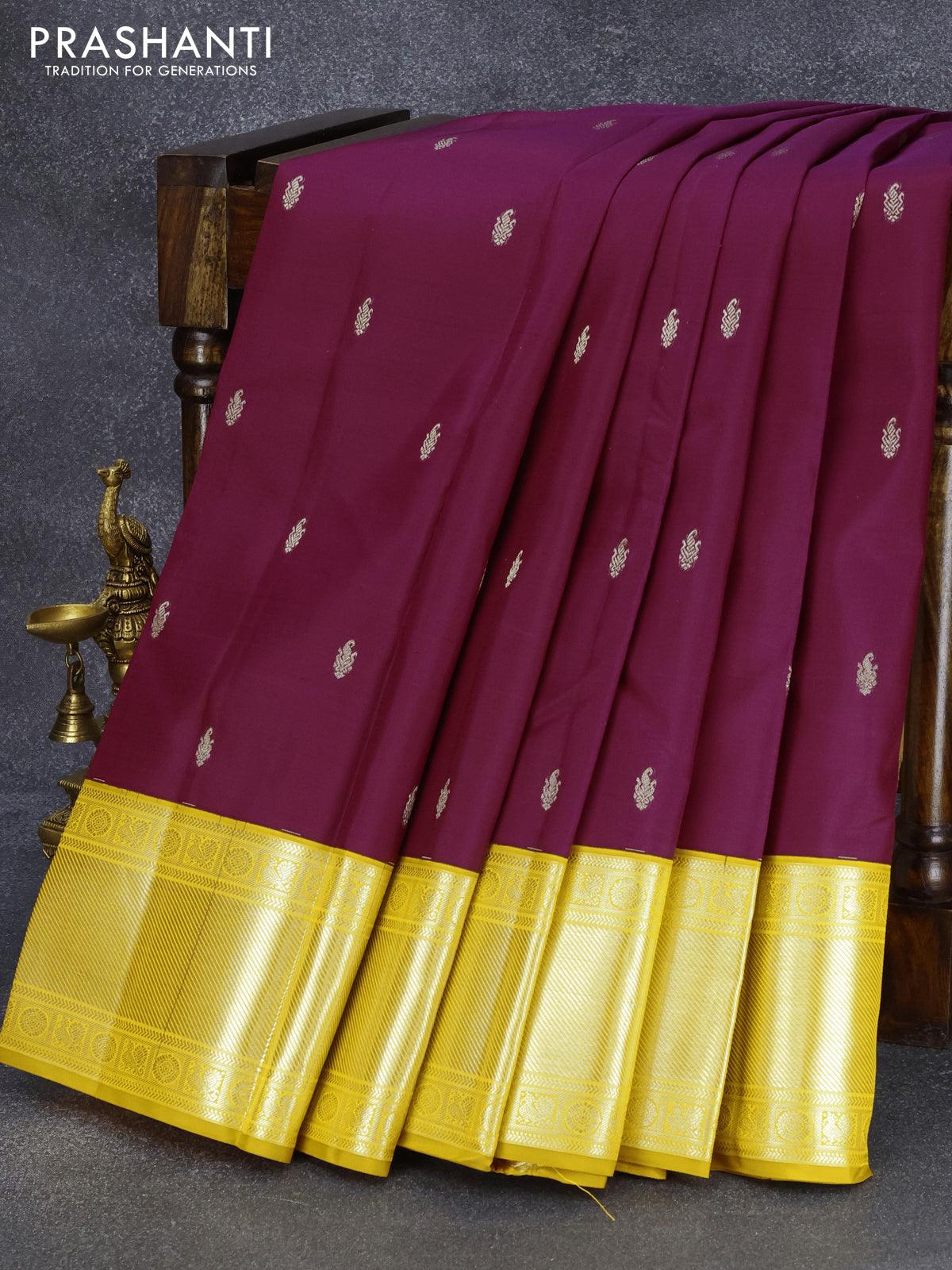 Pure kanjivaram silk saree magenta pink and yellow with silver zari woven buttas and silver zari woven border