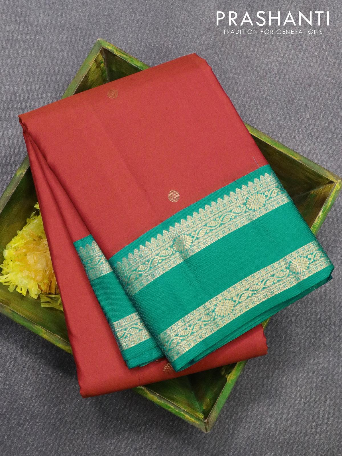 Pure kanjivaram silk saree reddish orange and teal blue with zari woven buttas and rettapet zari woven korvai border