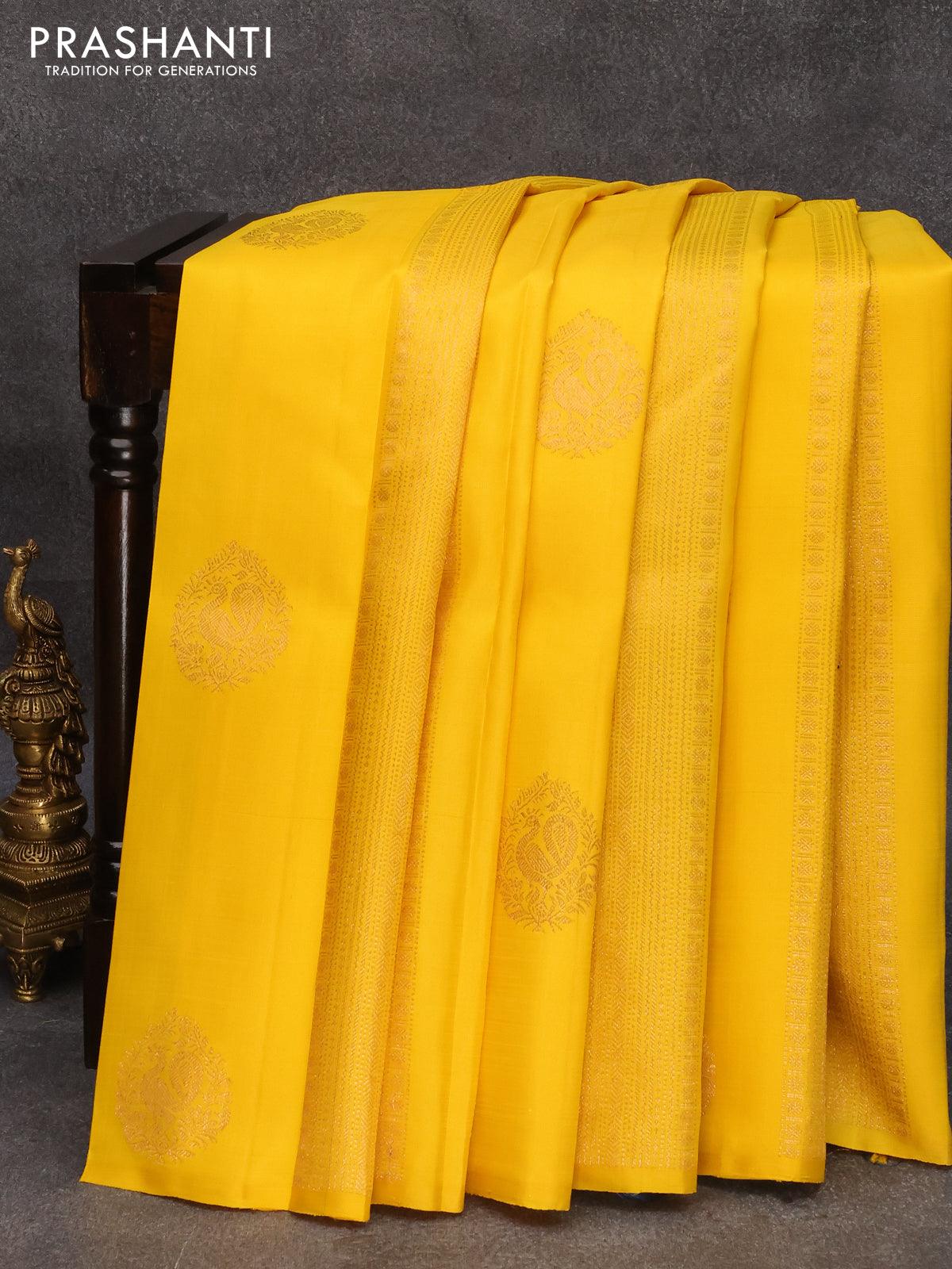 Vishal Prints Golden Yellow Chiffon Saree With Embroidery Work And Fan