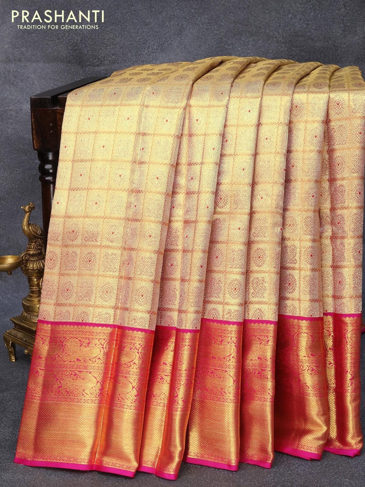 Gadwal pure silk saree in pink with gold & silver motifs on the...