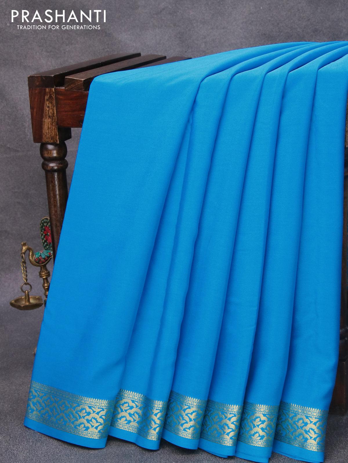 Pure mysore silk saree light blue and  with plain body and zari woven border