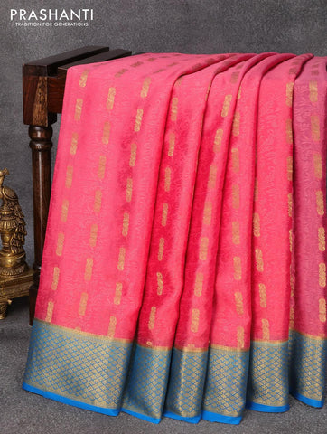 Pure mysore silk saree peach pink and cs blue with allover self emboss & zari woven buttas and zari woven border