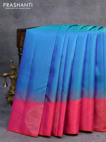 Pure soft silk saree dual shade of bluish green and dual shade of pinkish orange with allover zari woven stripes pattern and silver zari woven butta border