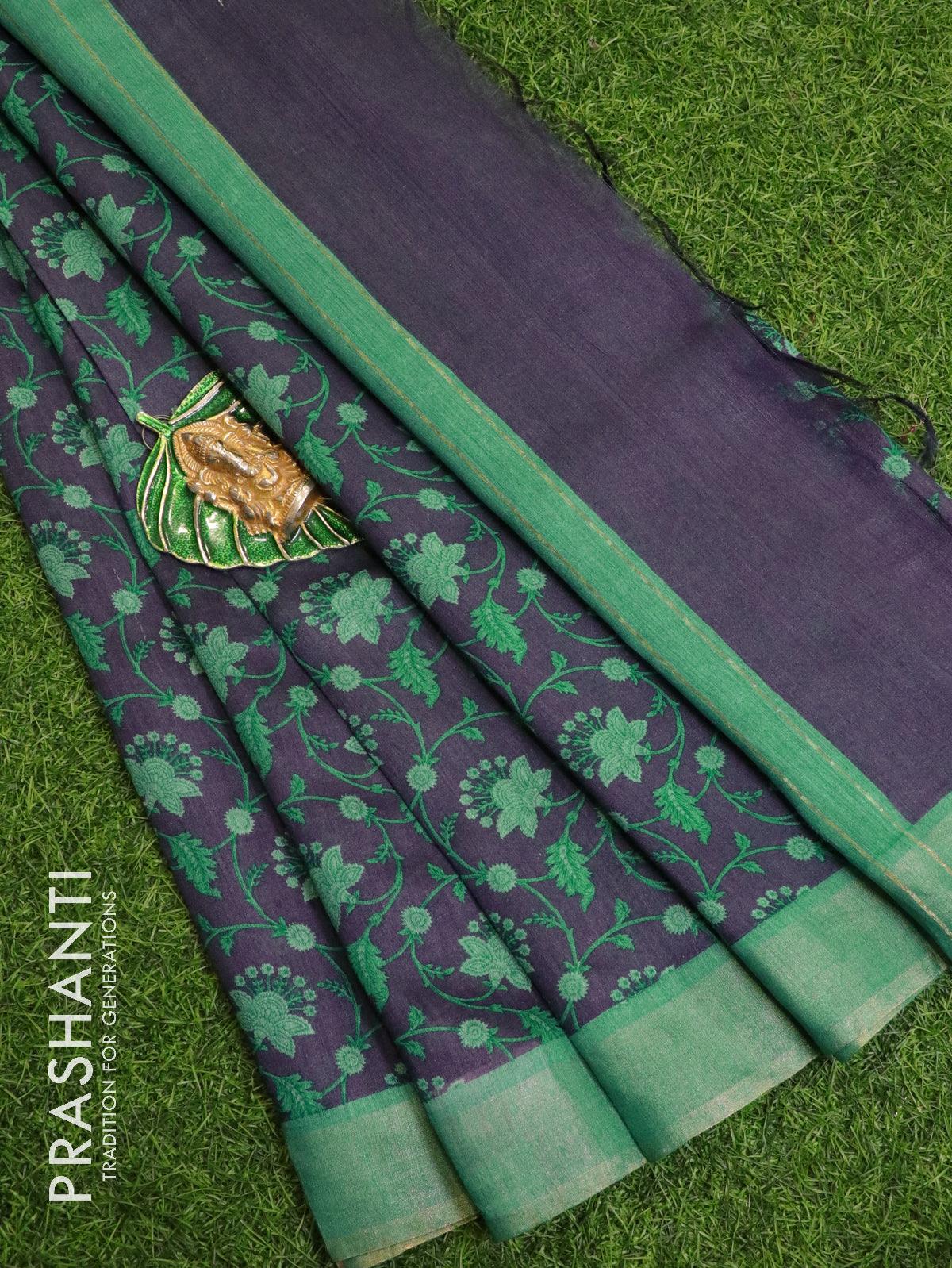 Pure tussar georgette saree blue and teal green with allover floral prints and zari woven border