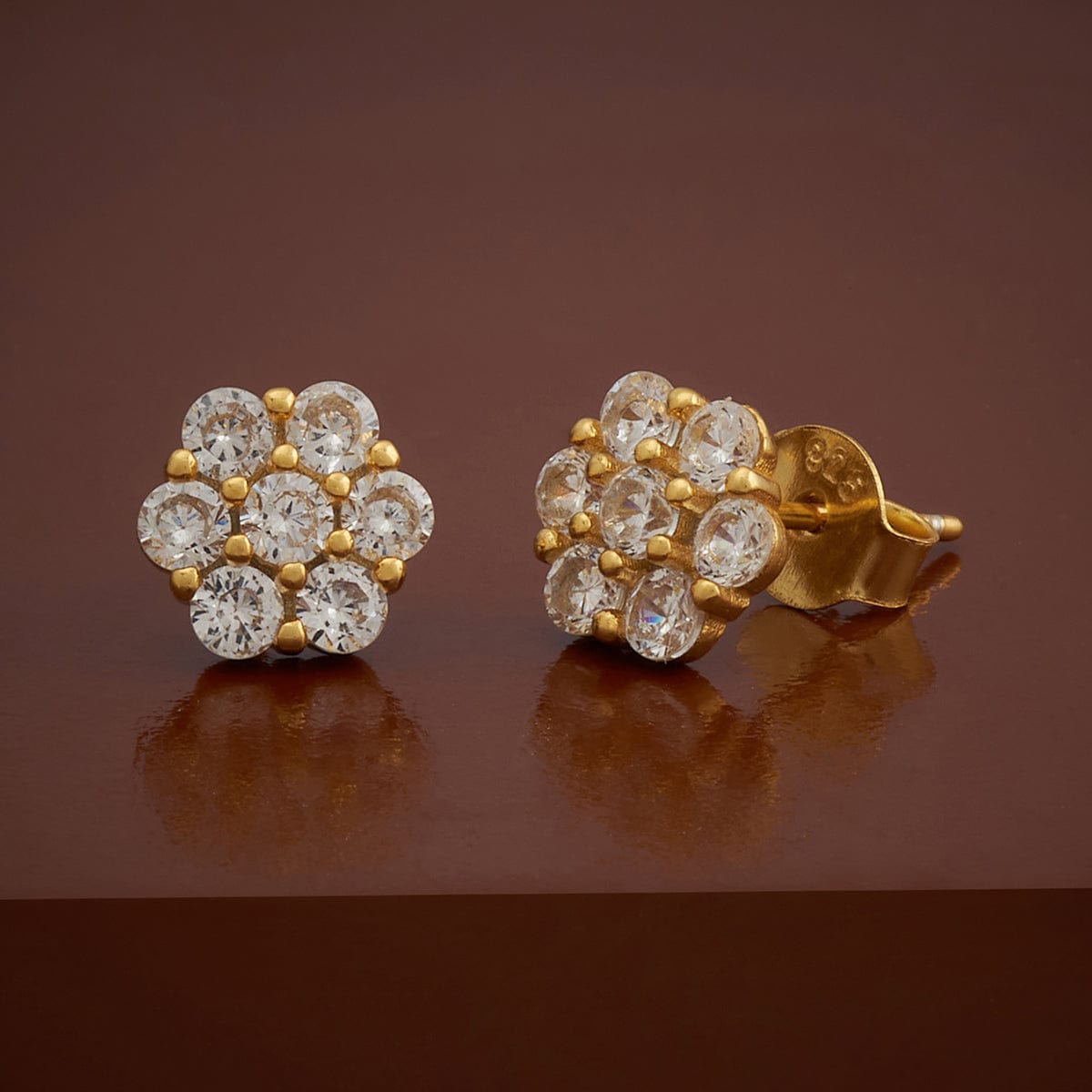 ERG109 - Sparkling American Diamond Seven Stone Studs for Women - Buy  Original Chidambaram Covering product at Wholesale Price. Online shopping  for guarantee South Indian Gold Plated Jewellery.