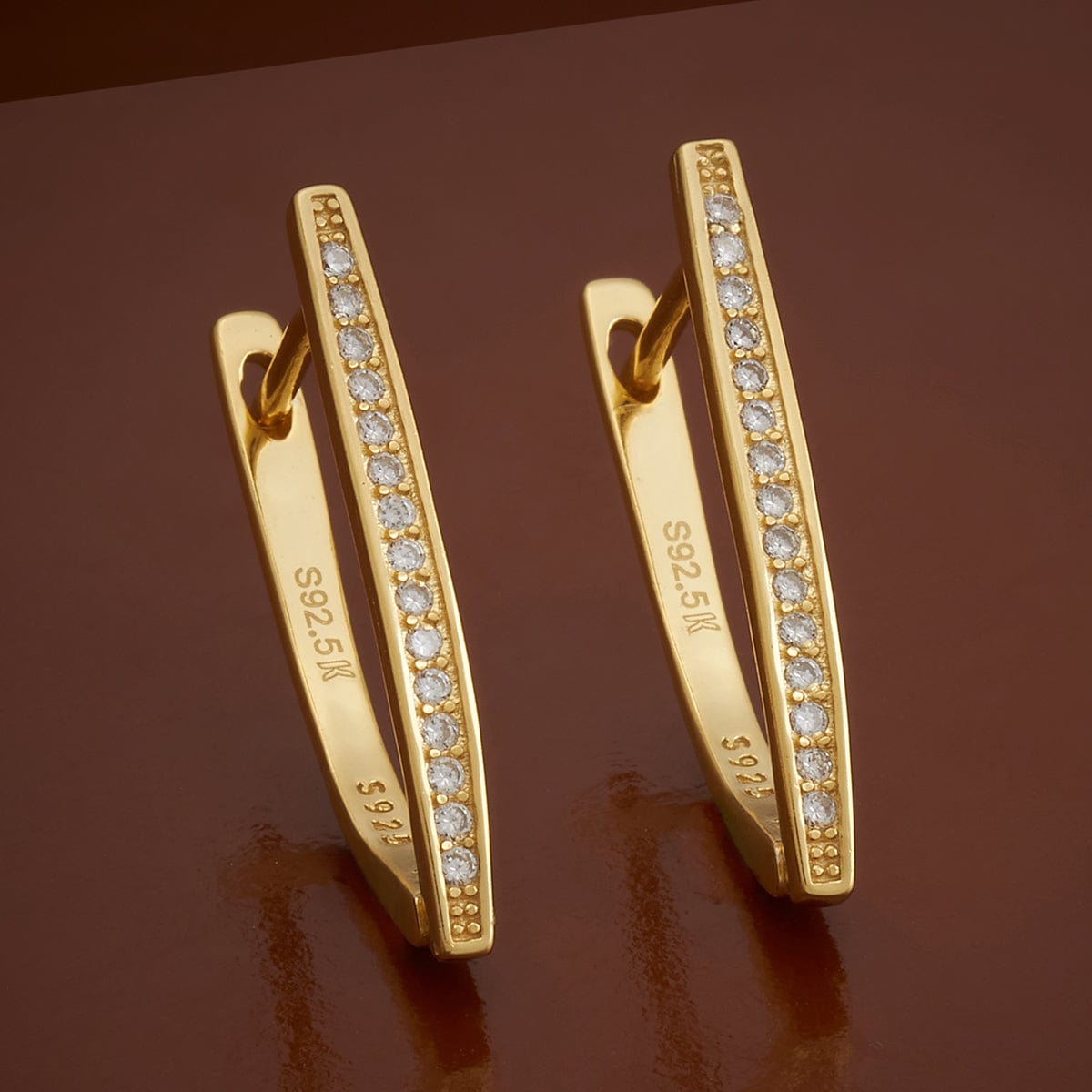 Pure gold store earrings under 5000