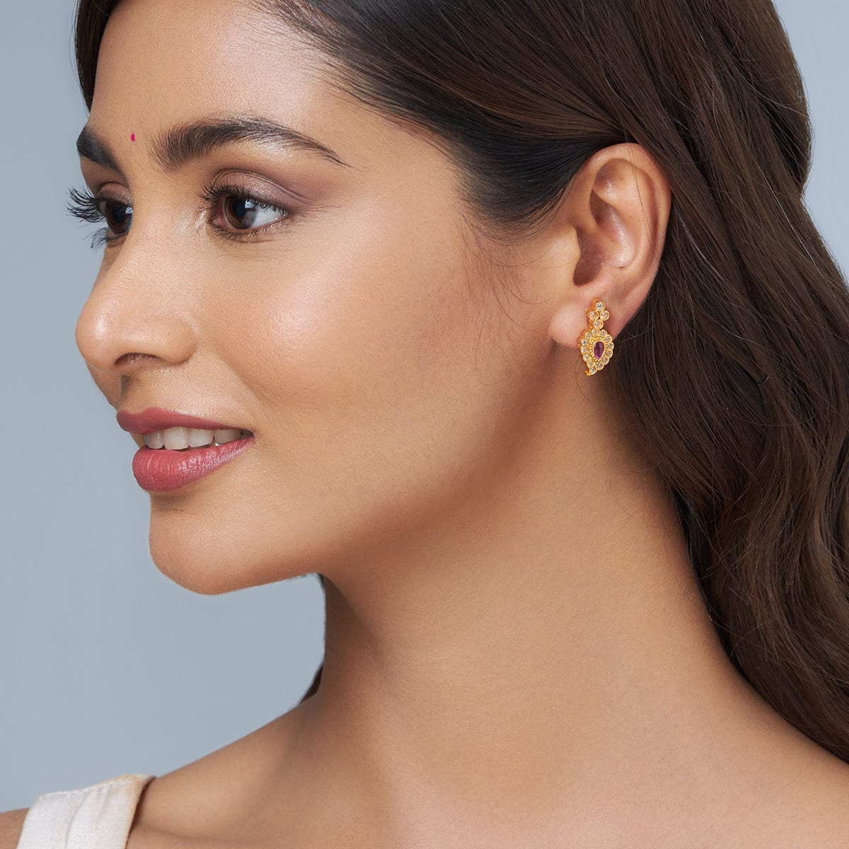 Elegant stud earrings... - CaratLane: A Tanishq Partnership | Facebook