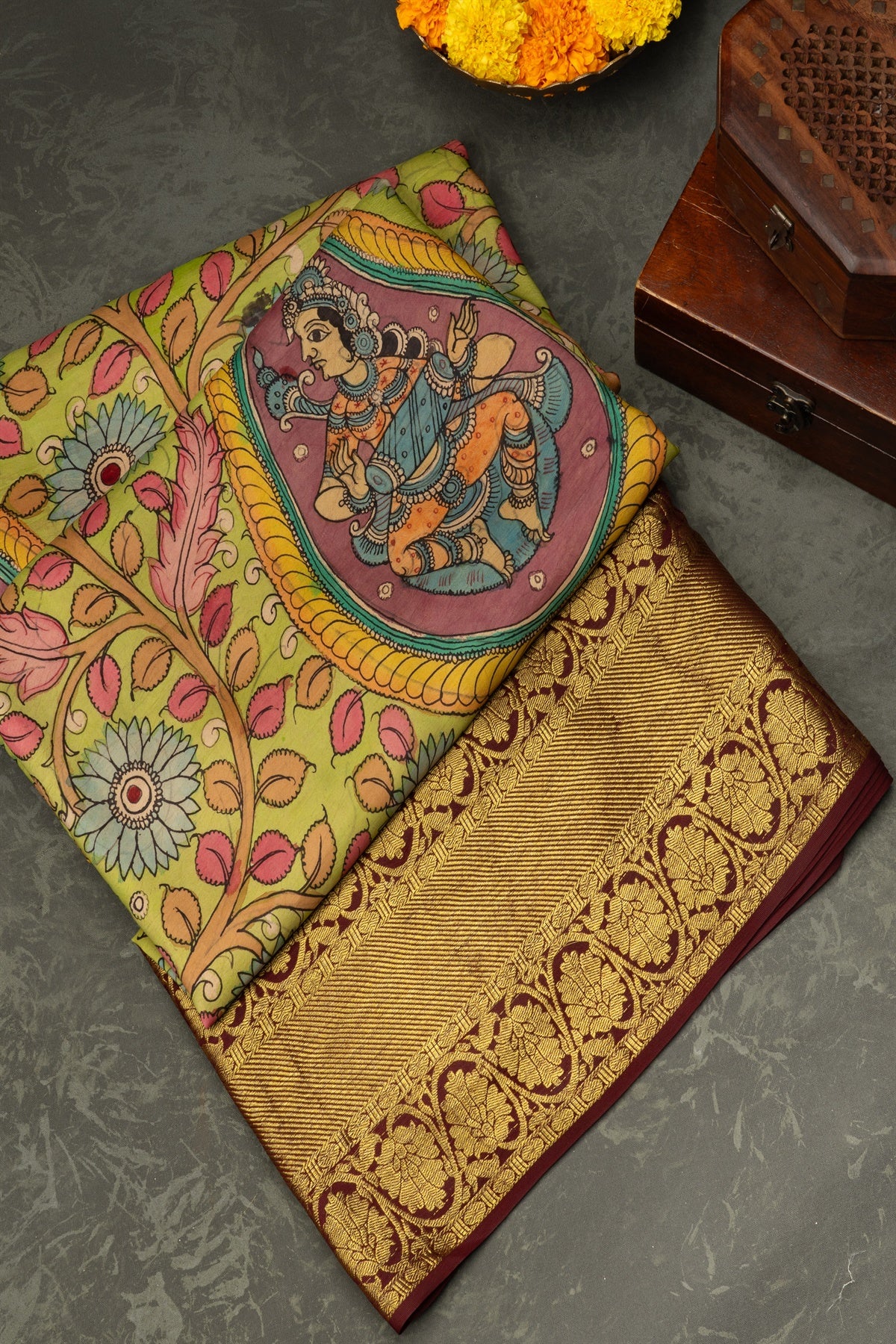Varamahalakshmi Light Green & Brown Kalamkari Print Florals Saree