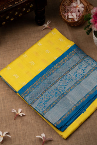 Mandir Yellow & Blue Kuppadam Buttis Saree