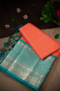 Mandir Peach Pink & Teal Kuppadam Floral Jaal Saree