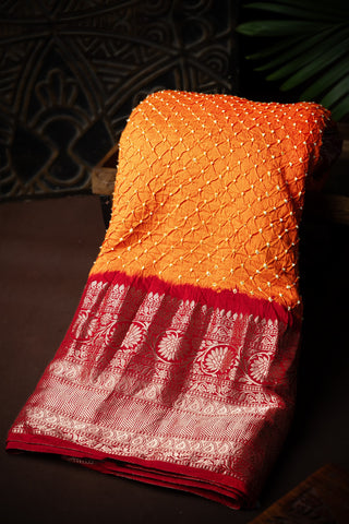 Varamahalakshmi Tangy Orange & Maroon Bandhani Bandhani Saree